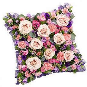 'Loose cushion in pinks and lilacs