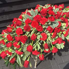 Red rose and red carnation spray