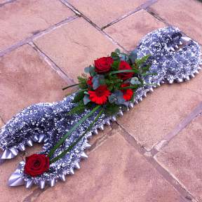 Funeral tribute in the shape of a Spanner
