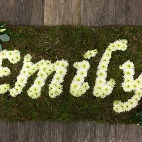 Name in flowers tribute